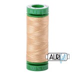 Spool of embroidery thread with a visible brand logo on a white background