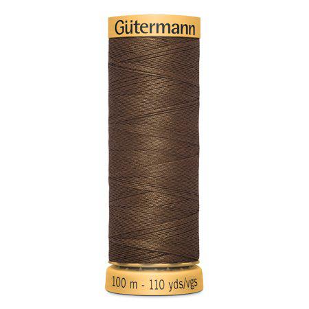 Spool of Gutermann thread on a white background