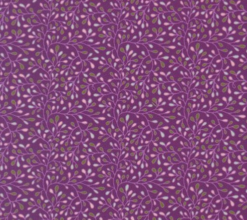Purple fabric with green leaf pattern
