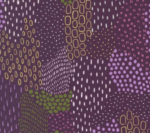 Patterned fabric with abstract shapes on a purple background