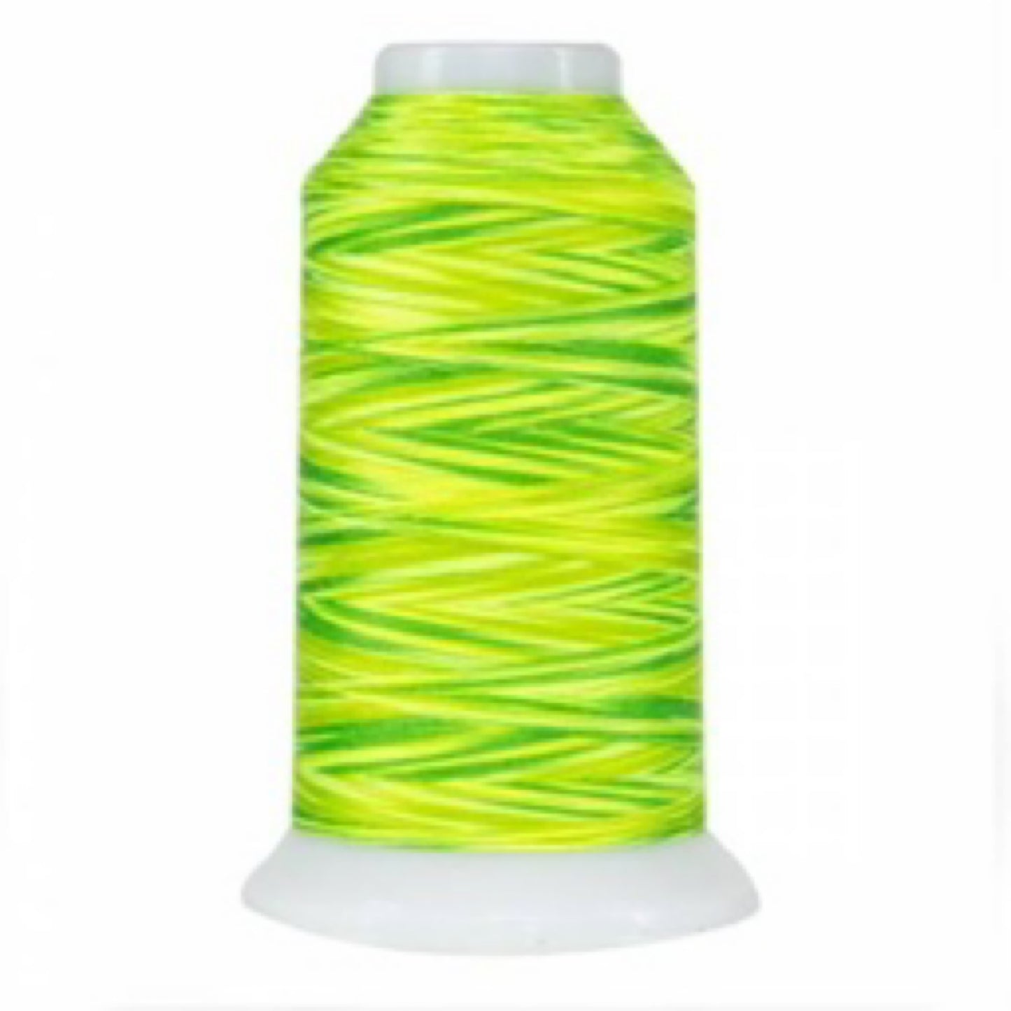 Spool of green and yellow thread on a white background