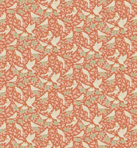 Patterned fabric with white birds and green leaves on a red background