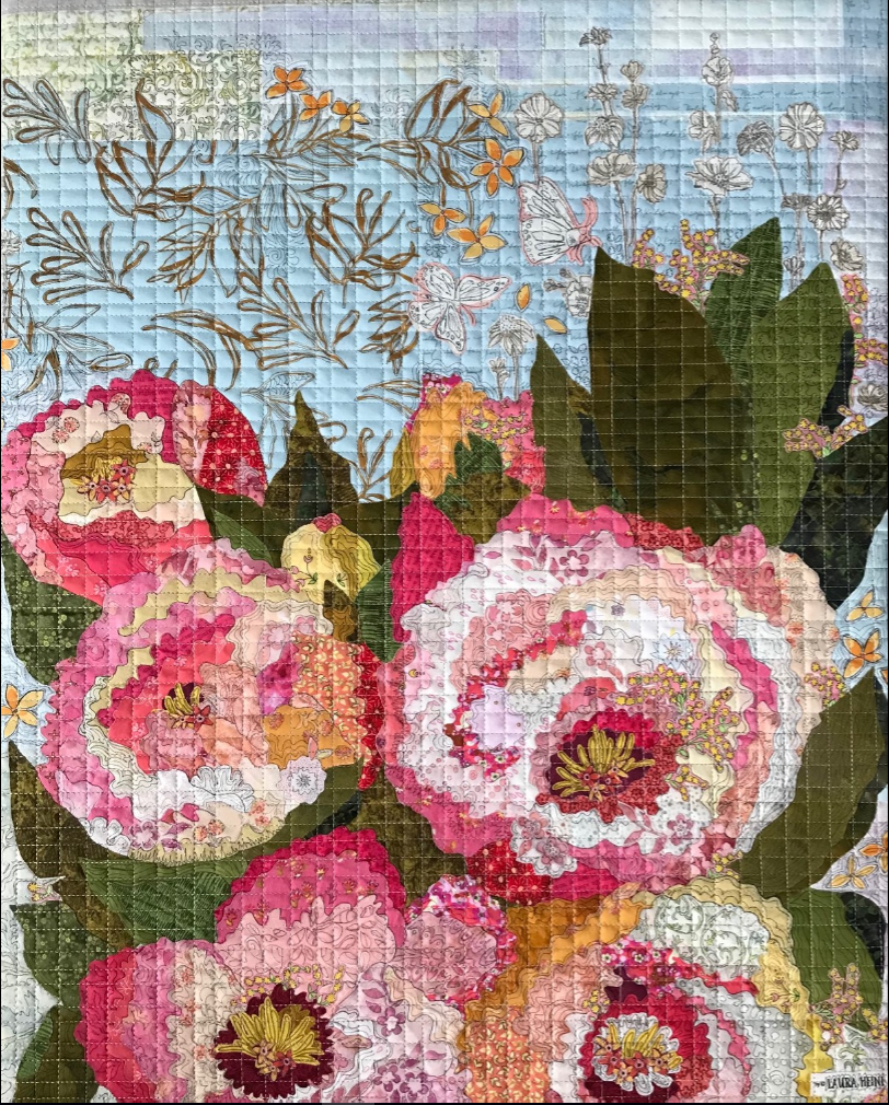 Floral cross-stitch pattern with pink and white flowers on a blue background