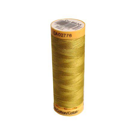 Spool of yellow thread with a label on a white background