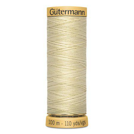 Spool of Gutermann thread on a white background