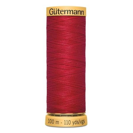 Spool of red thread with 'Gütermann' branding on a white background