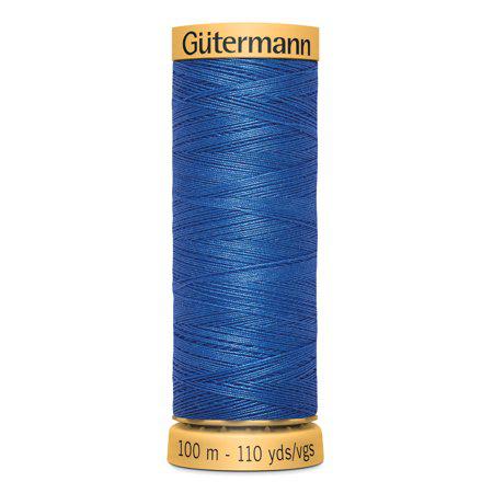 Spool of blue thread with 'Gütermann' branding on a white background