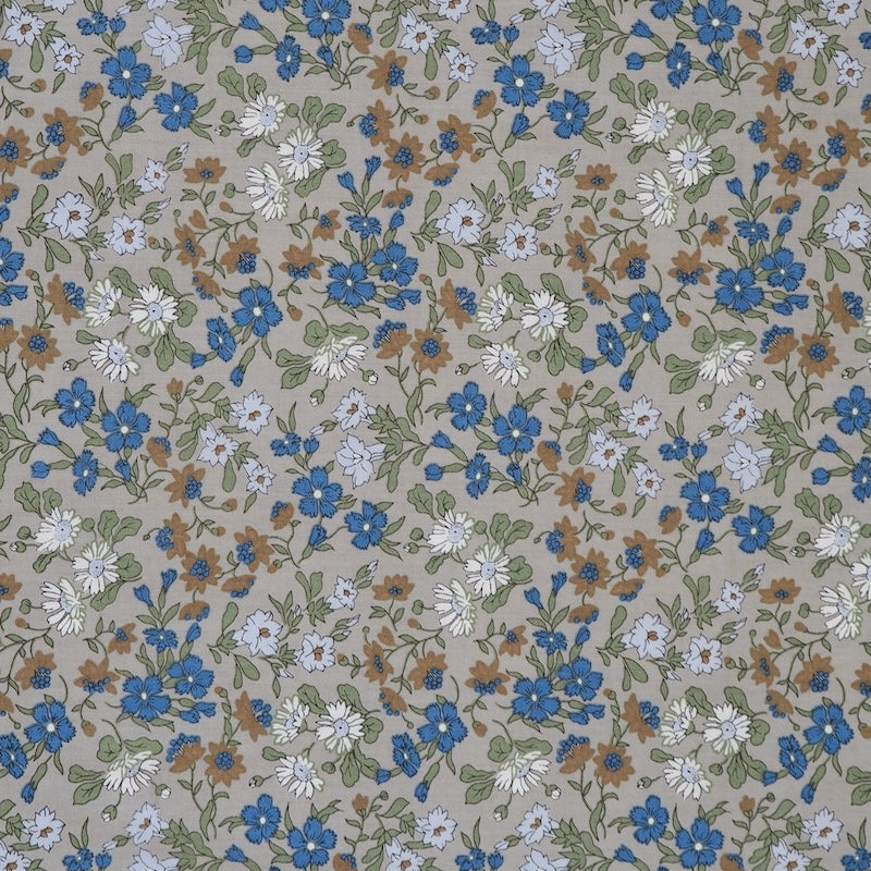 Floral pattern with blue, white, and brown flowers on a beige background