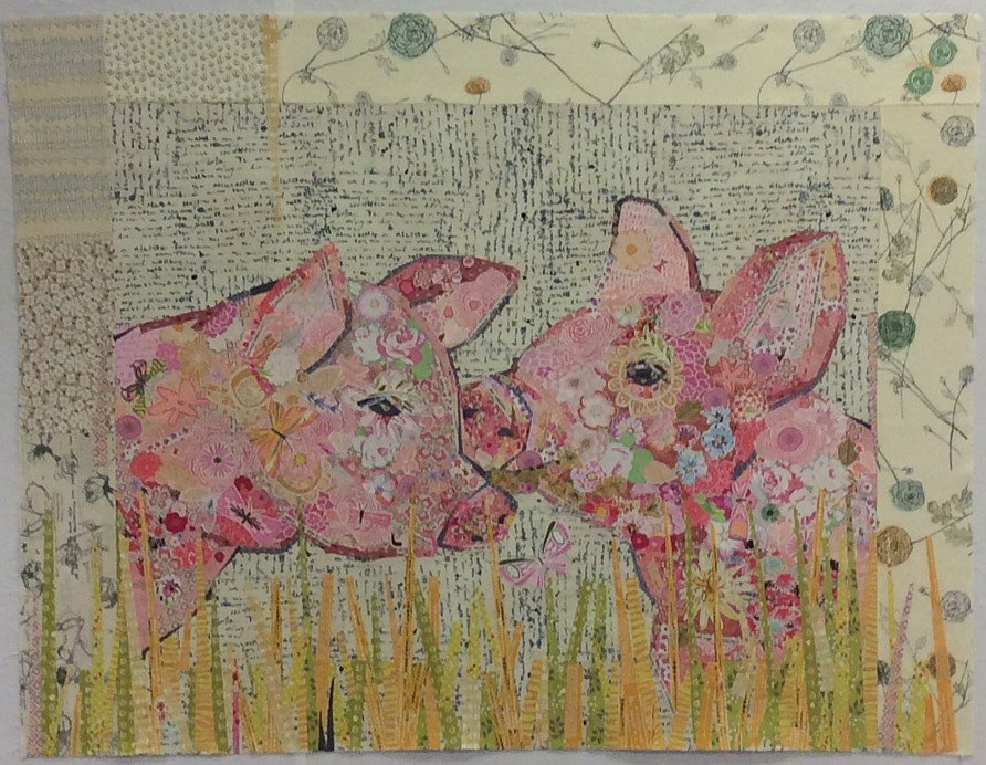 Lola & Olive collage quilt pattern by Laura Heine featuring two cute pigs in a floral fabric collage design