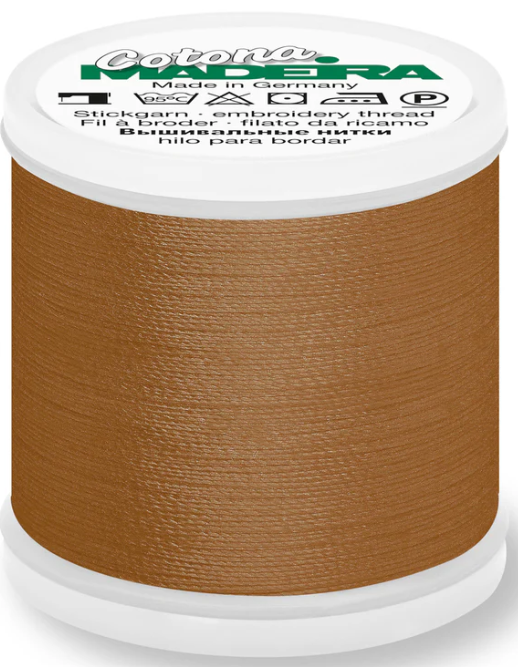 Spool of Madeira Cotona 30wt 100% cotton thread in Saddle Brown, color 677