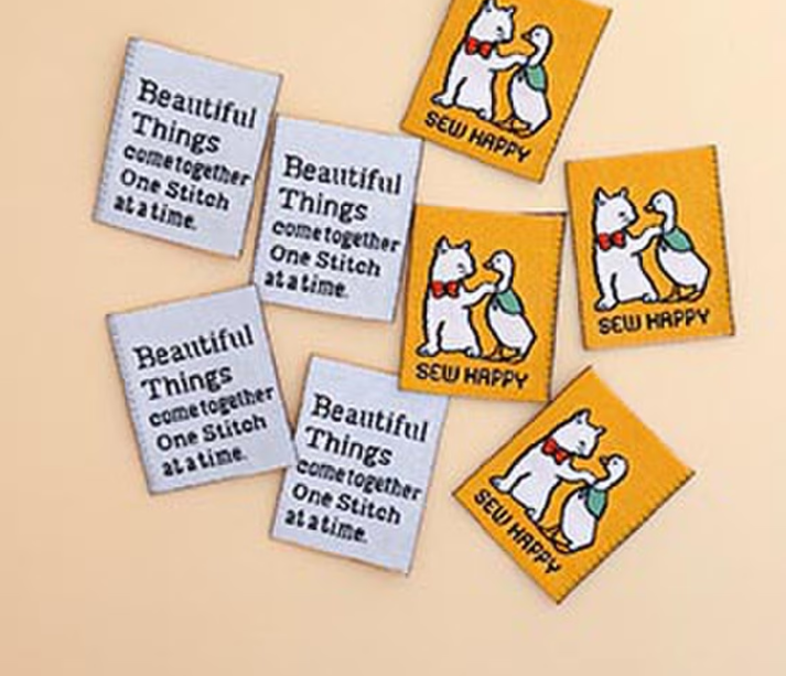 Minki Kim Sew Happy woven labels by Riley Blake for quilts and bags