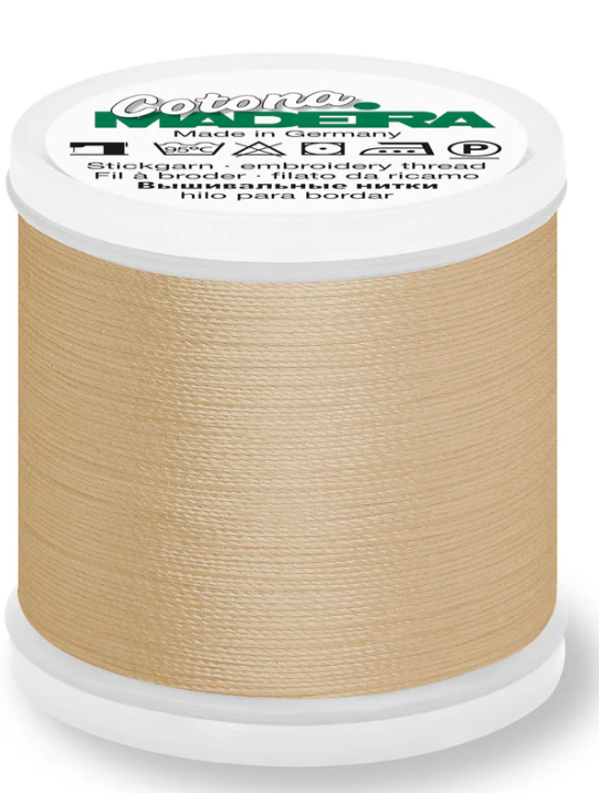 Spool of Madeira Cotona 30wt thread in Tan, color 659