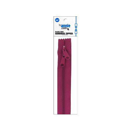 Handbag zipper on a white background with packaging