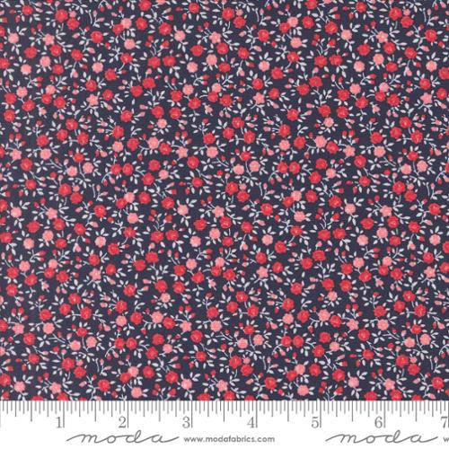 Floral fabric pattern with red and pink flowers on a dark blue background, featuring Moda label.