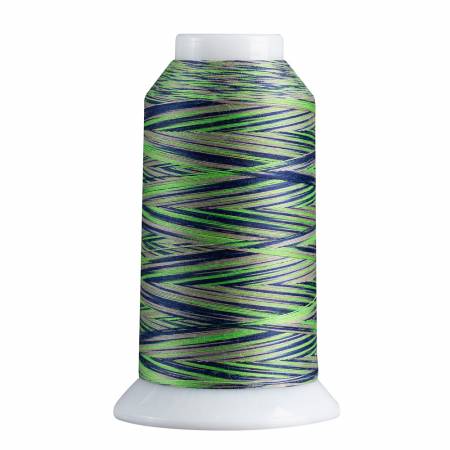 Spool of green and blue thread on a white background