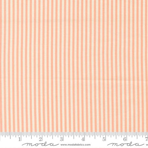 Fabric swatch with a subtle striped pattern on a peach background, featuring the Moda Fabrics logo.