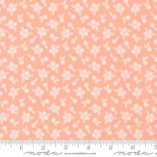 Floral pattern fabric swatch on a peach background with Moda label.