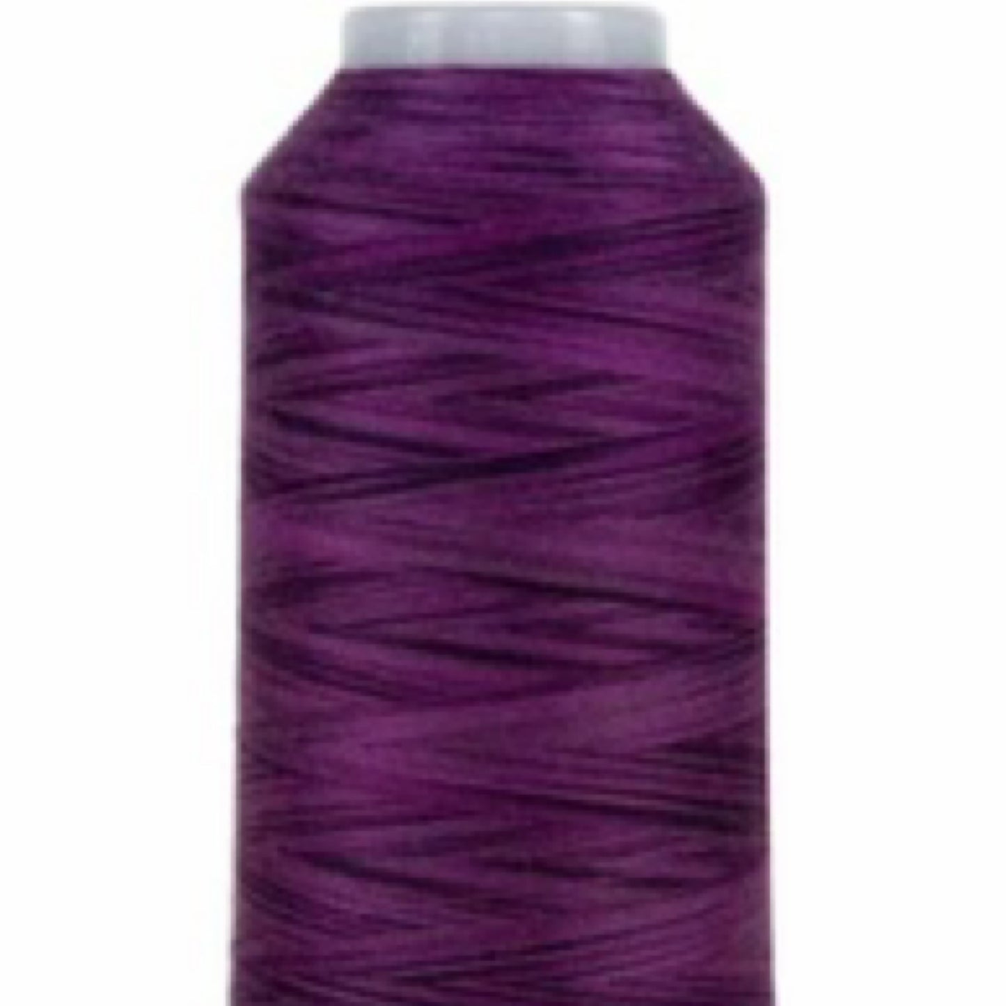 Spool of purple thread on a white background