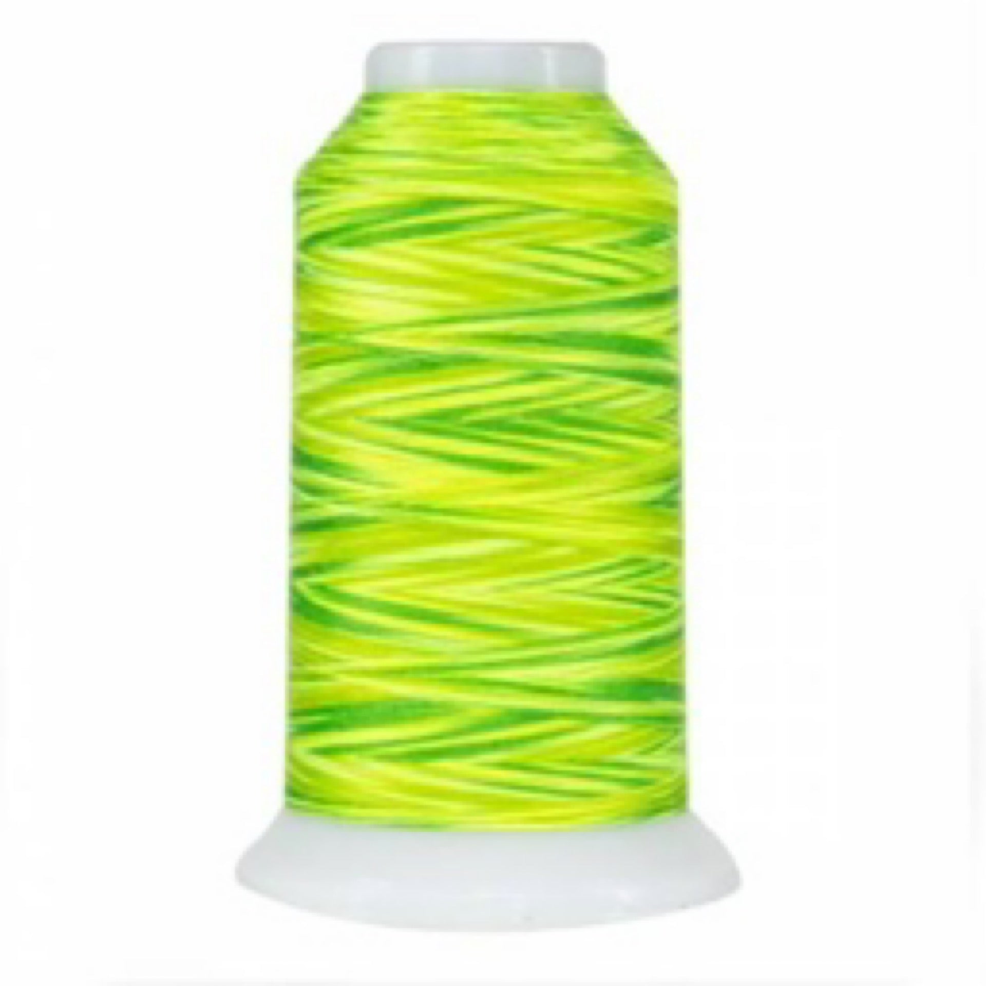 Spool of green and yellow thread on a white background