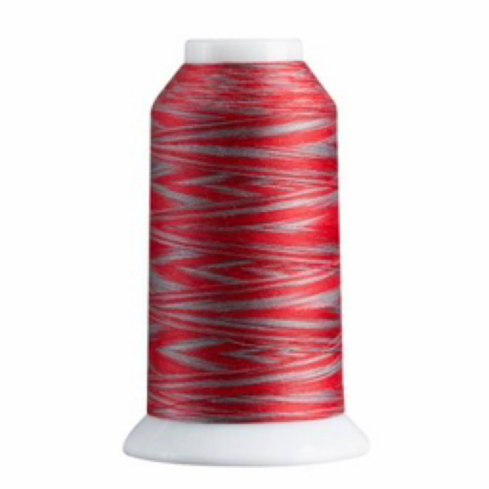 Spool of red and gray thread on a white background