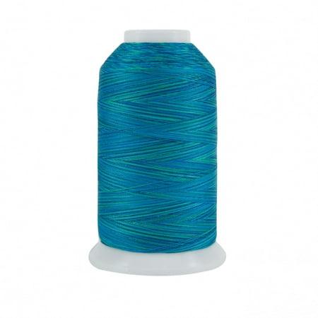Spool of blue thread on a white background