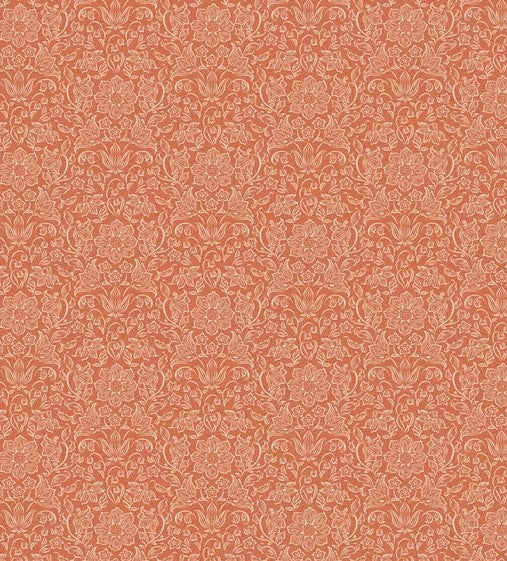 Patterned fabric swatch with intricate design on a red background
