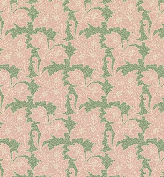 Patterned fabric with green floral design on a pink background