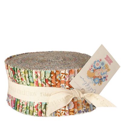 Fabric roll with colorful patterns and a matching label on a white background