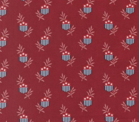 Pattern of small flags and stars on a red background