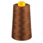 Spool of brown thread with a yellow cap on a white background