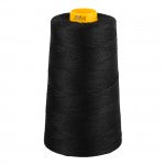 Spool of black thread with a yellow end on a white background