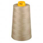 Spool of beige thread with a yellow label on a white background