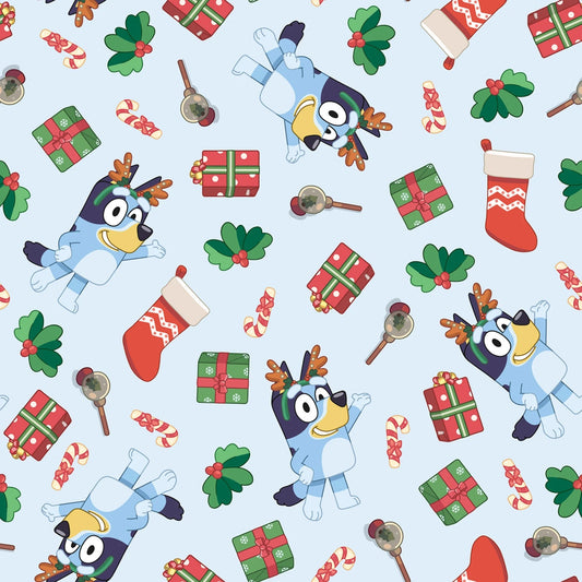 Christmas-themed pattern with cartoon characters, presents, and festive items on a light blue background.
