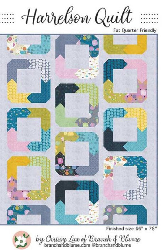 Harrelson Quilt pattern with colorful geometric shapes and branding details.