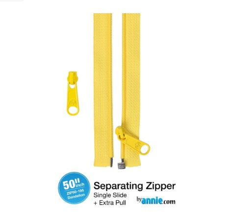 Yellow separating zipper with slide and pull on a white background, branded by annie.com.