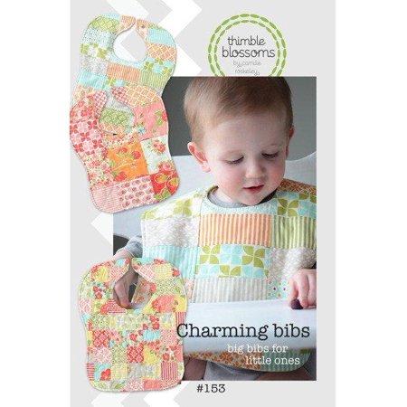 Product packaging for 'Charming bibs' with a child wearing a bib, featuring the brand 'thimble blossoms'.