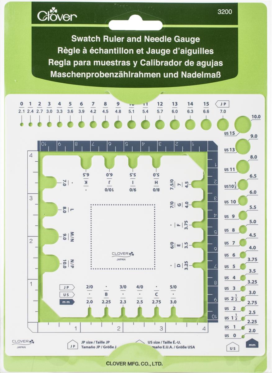 Clover swatch ruler and needle gauge on a green background
