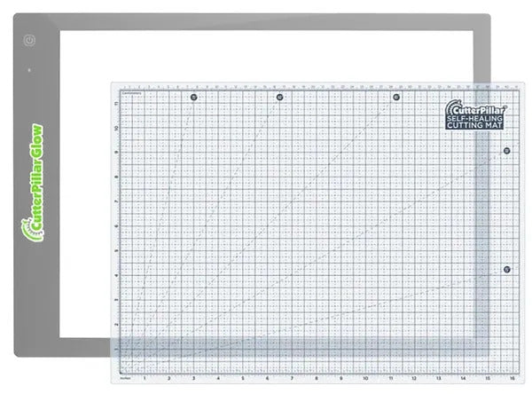 Self-healing cutting mat with grid pattern and brand logo on a white background