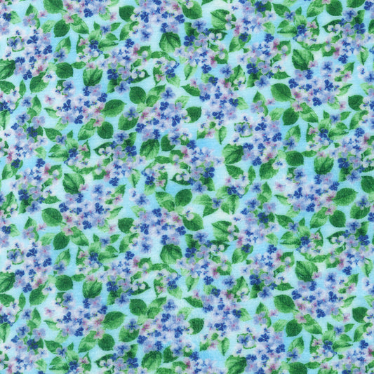 Floral pattern with blue, purple, and green flowers on a light blue background