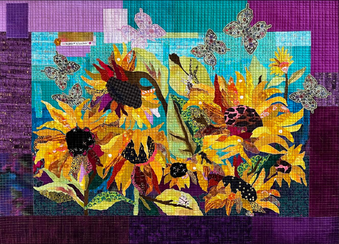 Facing the Sun collage quilt pattern by Laura Heine featuring a vibrant sunburst design