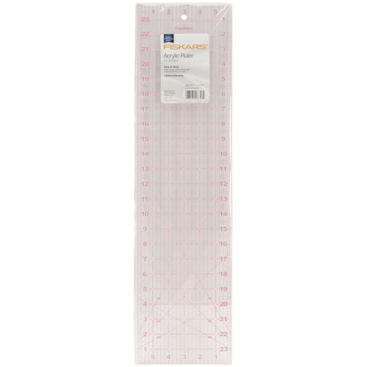 Fiskars acrylic ruler with grid lines on a white background