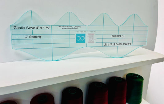 Hairdressing ruler with measurements on a white shelf with hair extensions.