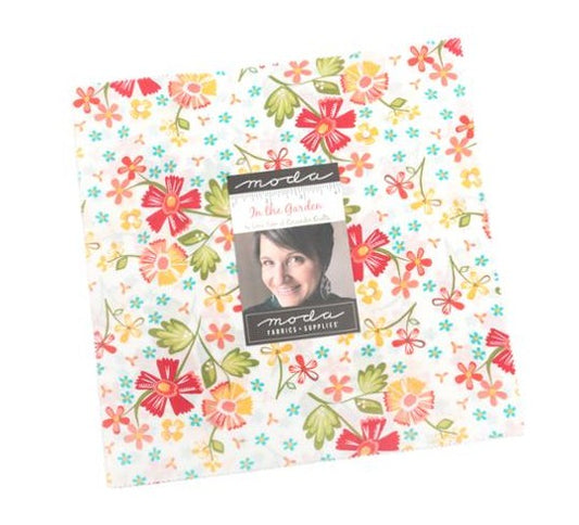 Floral patterned fabric with Moda label on a white background