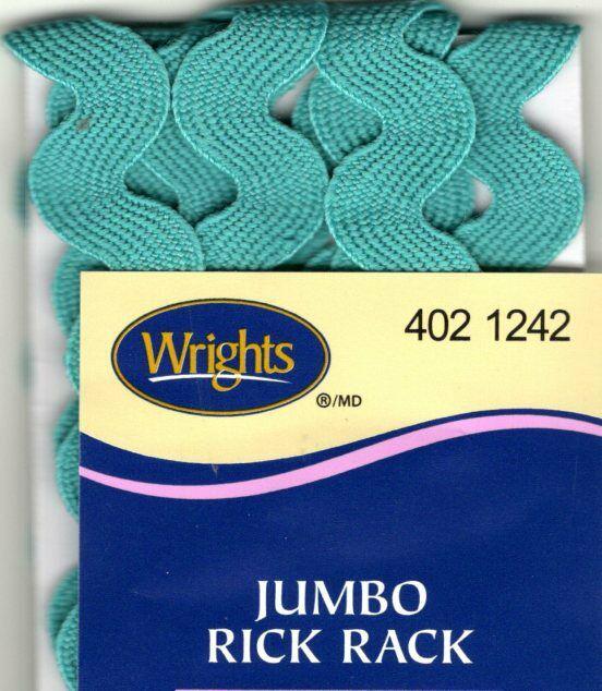 Teal jumbo rick rack with Wrights brand label on a blue background