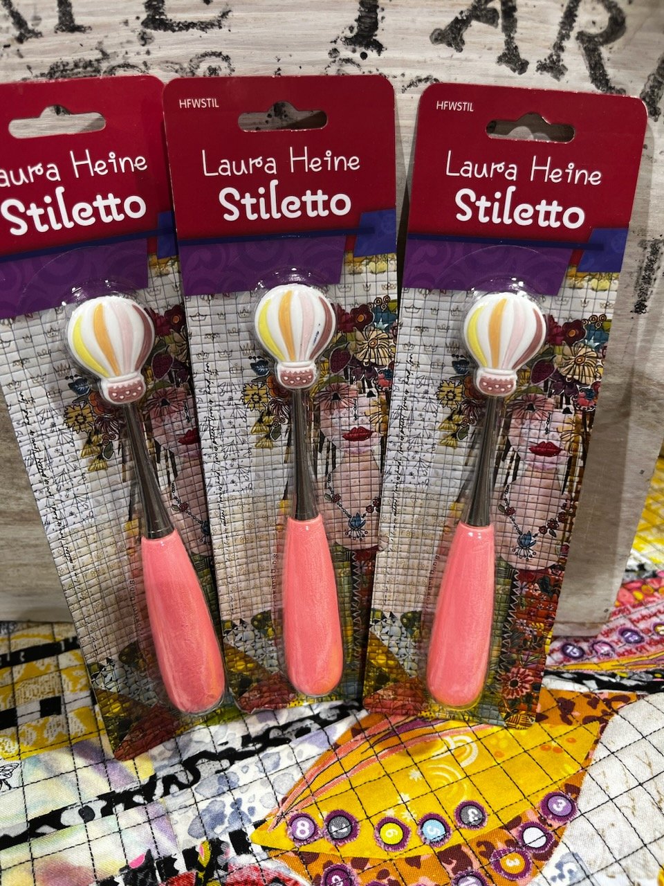 Laura Heine Stiletto tool for precise placement of fabrics in collage quilting projects