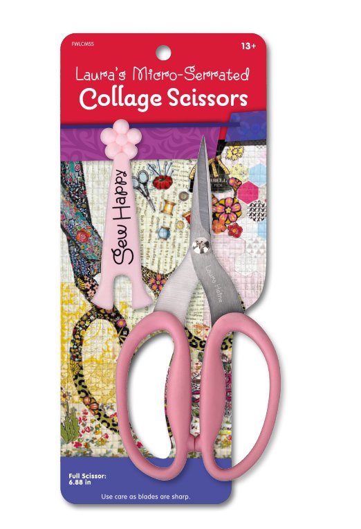 Collage scissors with pink handles on a colorful packaging background