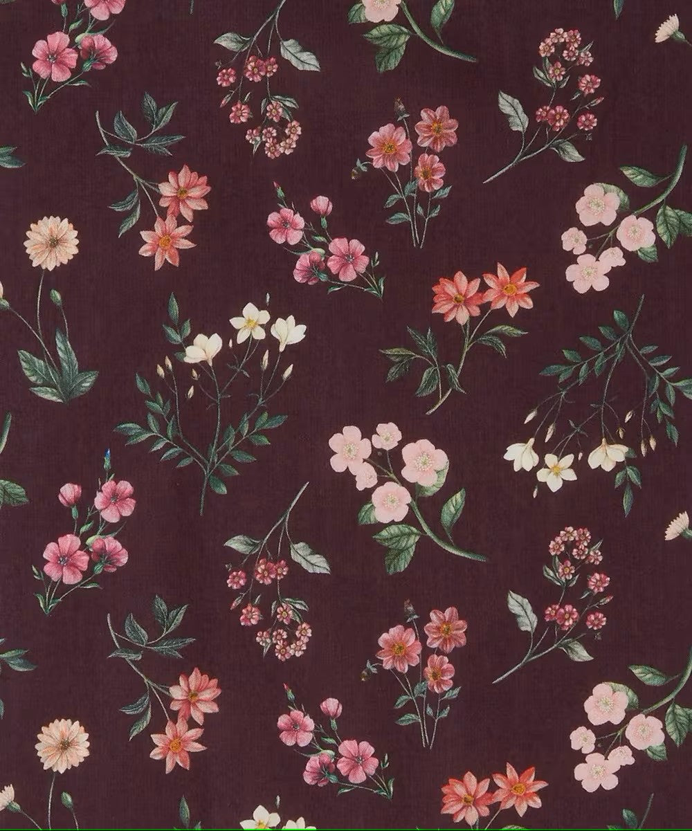 Floral pattern with pink, orange, and white flowers on a dark background