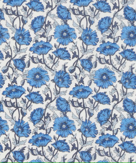 Pattern of blue flowers on a white background