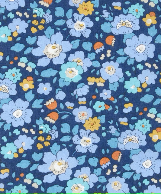 Floral pattern with blue flowers on a dark blue background