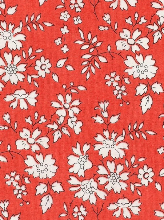 White floral pattern on a red background
